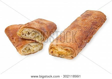 Baking Puff Pastry With Potatoes And Sesame, One Pastry In The Cut.