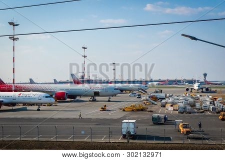 Moscow, Russia - March 2019: Aircrafts On The Runway Of Moscow Sheremetyevo Airport Departure Termin