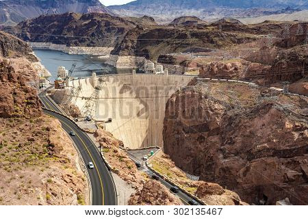 Hoover Dam, A Concrete Arch-gravity Dam Located On The Nevada And Arizona Border, A Top Tourist Attr