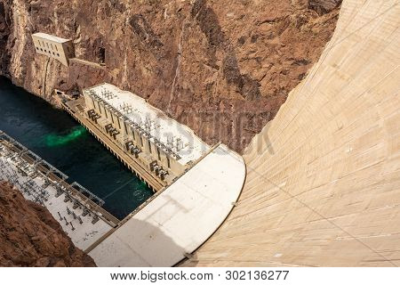 Hoover Dam, A Concrete Arch-gravity Dam Located On The Nevada And Arizona Border, A Top Tourist Attr