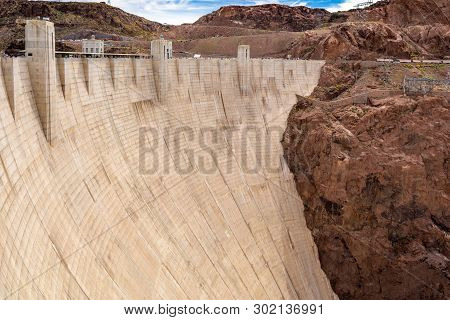 Hoover Dam, A Concrete Arch-gravity Dam Located On The Nevada And Arizona Border, A Top Tourist Attr