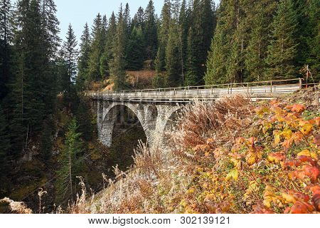 Bridge Lechtalstrasse Over The Brook Stream Gizzibach On A Cloudy Autumn Day Near The Village Of Lec