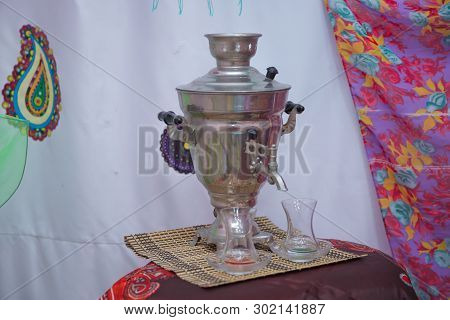 Crystal Glass Of Tea On With Metal Samovar . Azerbaijan Tea Samovar Concept Traditional Azerbaijan C