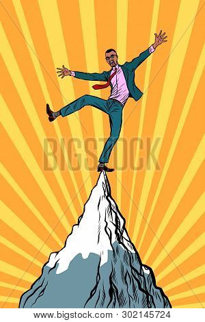 African Businessman At The Top Of The Mountain. Pop Art Retro Vector Illustration Vintage Kitsch