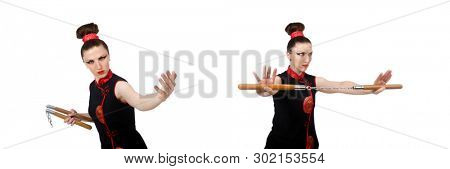 Funny woman with nunchucks isolated on white