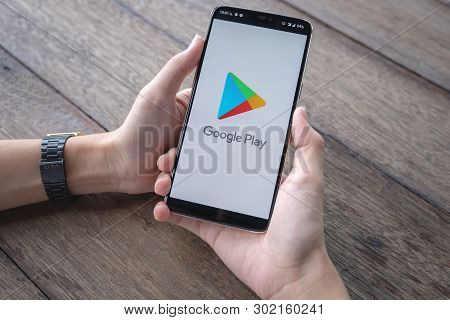 Chiang Mai, Thailand - May 11,2019 : A Man Holds Oneplus 6 With Google Play Application On The Scree