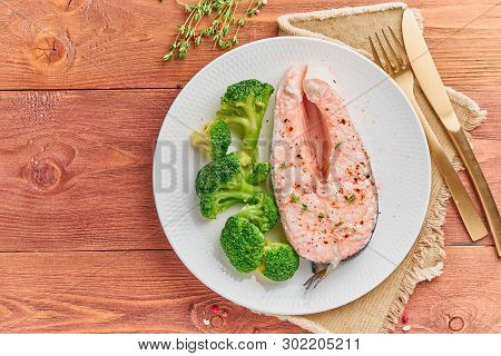 Steam Salmon And Vegetables, Paleo, Keto, Fodmap Diet. White Plate On A Rustic Wooden Table, Top Vie