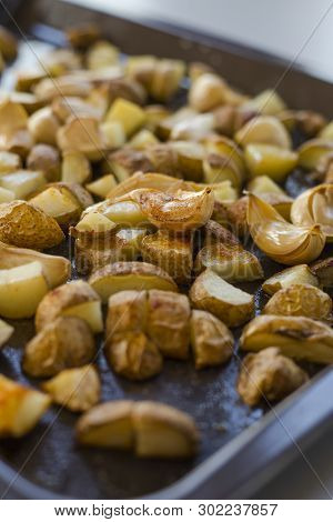 Roasted Potatoes Close Carlic Clovesin The Trey