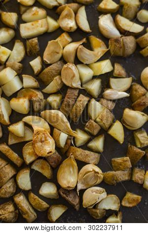 Roasted Potatoes Close Carlic Clovesin The Trey