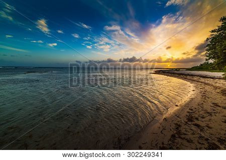 Scenic Sunset In Bois Jolan Beach In Guadeloupe, Caribbean Sea