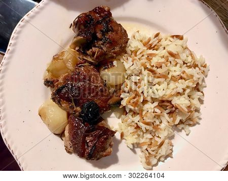 Lamb Arm Meat With Rice Pilav Or Pilaf Served With Plate.
