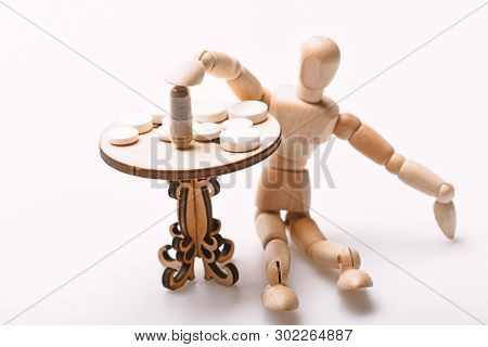 Medication Regimen. Human Wooden Dummy Near Table With Medicines. Tips Tackling Complex Medication R