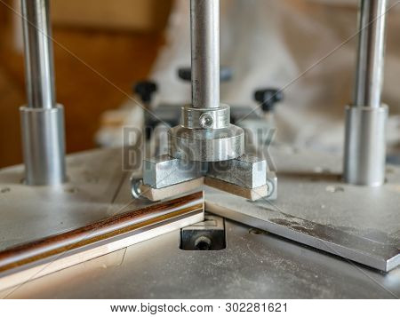 Picture Framers Tool, Underpinner Close Up Shot In A Small Workshop.