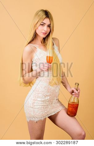 Club And Adult Party. Girl Drinking Pearl Glitter Champagne. Woman White Dress Hold Glass Alcohol Dr