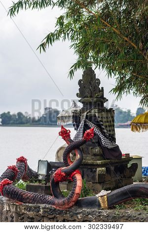 Bali, Indonesia - February 25, 2019: Ulun Danu Beratan Temple Complex In Bedoegoel. Closeup Of Two B