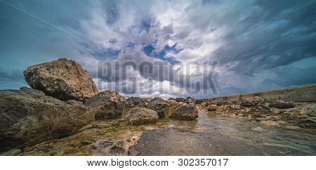 Large Stones And Boulders On The Shore In Alykes Bay,  Zante Island, Greece