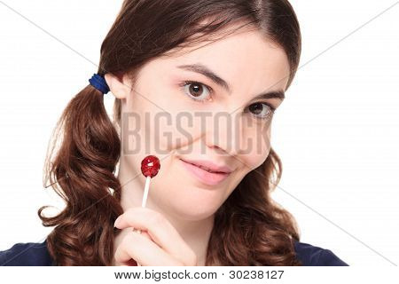 สาวผู้ใหญ่ใน Pigtails กับขนมอมยิ้ม