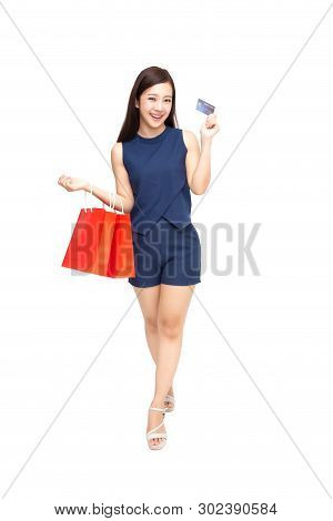 Happy Asian Woman Holding Credit Card Or Cash Advances And Shopping Bag, Pay Instead Of Money And Sp
