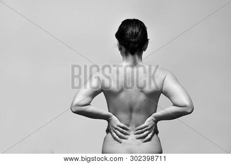 Middle Aget Woman With Low Back Pain