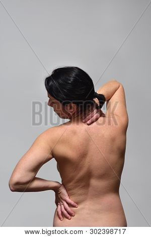 Middle Aget Woman With Pain Back On White Background