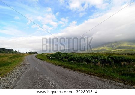 A Scenic View Of A Empty Road In The Middle Of The Isle Of Eigg In Scotland