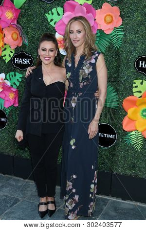 LOS ANGELES - MAY 20:  Jordan Whalen, Kim Raver at the Lifetime TV Summer Luau at the W Hotel on May 20, 2019 in Westwood, CA