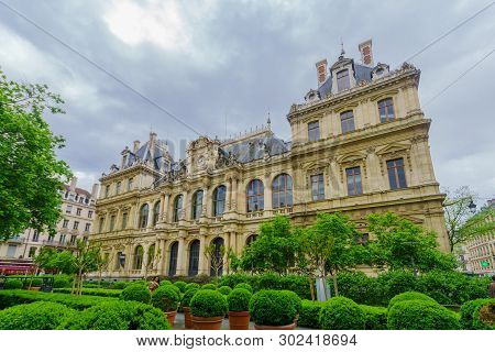 Lyon, France - May 09, 2019: The Palais De La Bourse Building, With Locals And Visitors, In Lyon, Fr