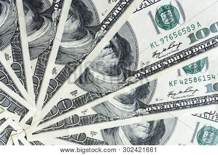Crolled Stack Of 100 Dollar Bills, Close Up Banknote