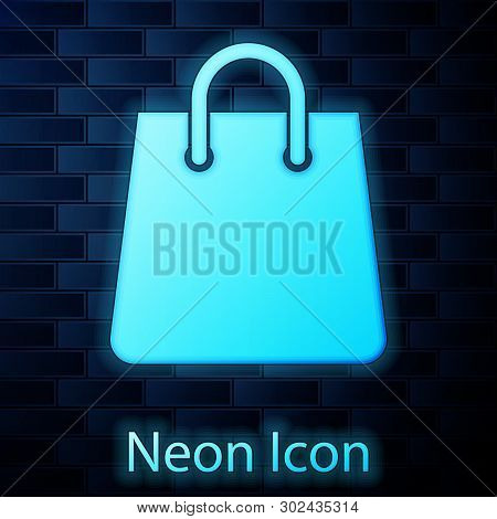 Glowing Neon Handbag Icon Isolated On Brick Wall Background. Shoping Bag Sign. Woman Bag Icon. Femal