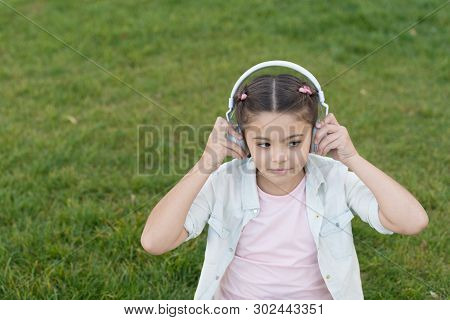 City Guide And Audio Tour. Girl Little Tourist Kid Using Audio Guide Mobile Application. Audio Tour 