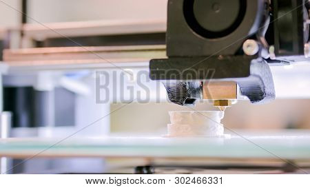 Print Head Of 3d Printer Machine Printing Plastic Model At Modern Scifi Technology Exhibition. 3d Pr