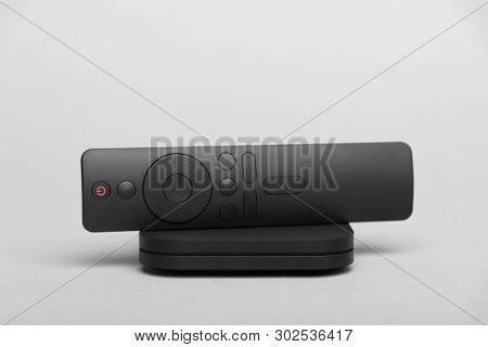 Tv Set-top Box For Ip Tv And Digital Video Content On A Gray Background. Digital Tv On Gray Backgrou