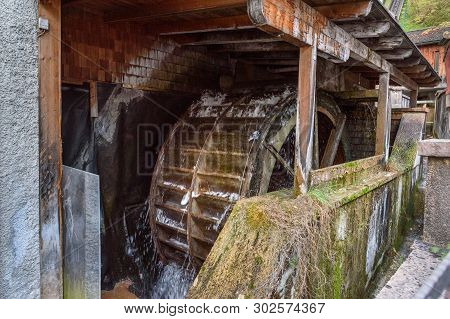 Waterwheel In Bakery Mill Of Stift Sankt Peter. St Peters Abbey In Salzburg. Austria