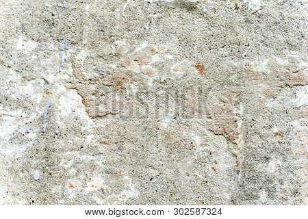 Fragment Of The Old Wall With Decaying And Fallen Off Plaster