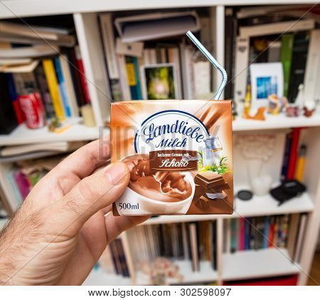 Paris, France - Mar 16, 2019: Man Hand Holding Landliebe Chocolate Milk With Plastic Straw Made In G