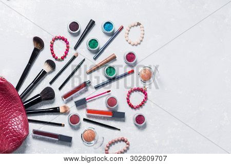 A Lot Of Bright Beautiful Professional Cosmetics Goes Red Purse On A White Light Background, Brush,