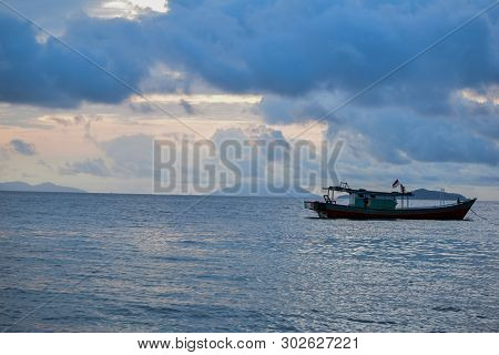 Traditional Fishing Wooden Boat Near Pahawang Island. Bandar Lampung. Indonesia. Traveling Concept. 
