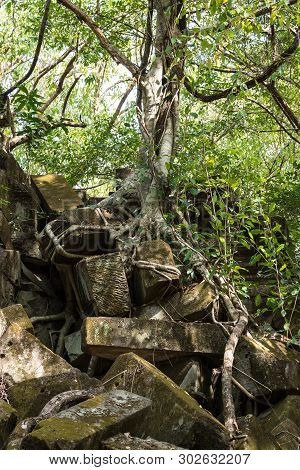 Ruins Of Ancient Beng Mealea Temple Over Jungle, Cambodia. Beng Mealea Is A Temple In The Angkor Wat