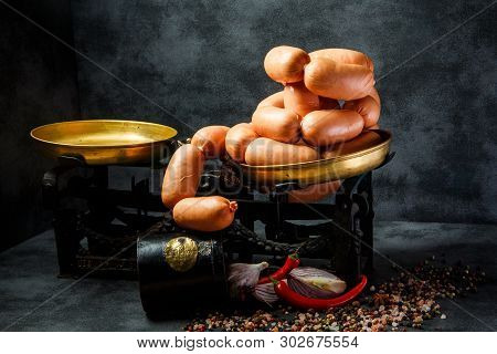 Big Heap Of Short Thick Wieners In Spiral With Onion And Chili