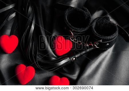 Sex Toys For Love And Bdsm On Valentines Day With Red Hearts