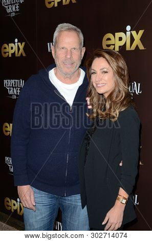 LOS ANGELES - MAY 21:  Steve Tisch, Dana Norris at the 