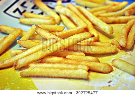 Golden French Fries Potatoes Ready To Be Eaten