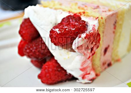 Raspberry cake during the family celebration during the day