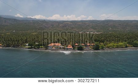 Aerial Seascape Luxury Hotel On Beach Background Mountainss In Tropical Resort. Bali, Indonesia, Tra