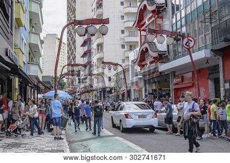 Sao Paulo Sp, Brazil - March 03, 2019: Stores And Commerce On The Galvao Bueno Street At Liberdade N