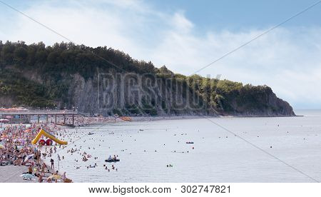 Olginka, Russia - May 24, 2019: Holidaymakers On The Beach, Olginka Village, Tuapse, The Black Sea, 