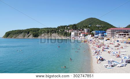 Olginka, Russia - May 24, 2019: Holidaymakers On The Beach, Olginka Village, Tuapse, The Black Sea, 