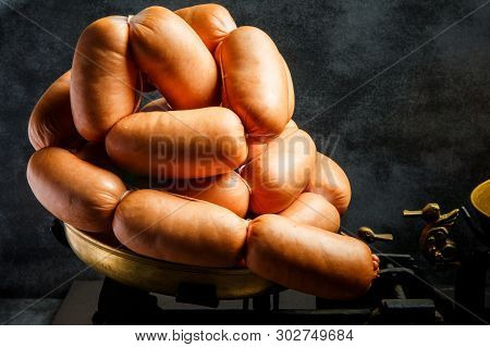 Closeup Bunch Of Short Thick Sausages Rolled In Spiral