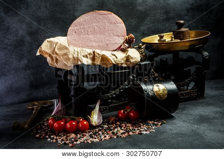 Big Piece Of Tasty Boiled Sausage On Piece Of Craft Paper