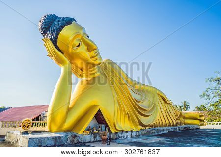 Lying Buddha Statue Made With Blue Sky Background